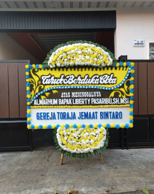 Papan Bunga Duka di Srono